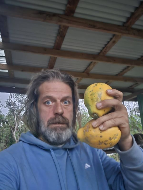 Jessie holding papayas
