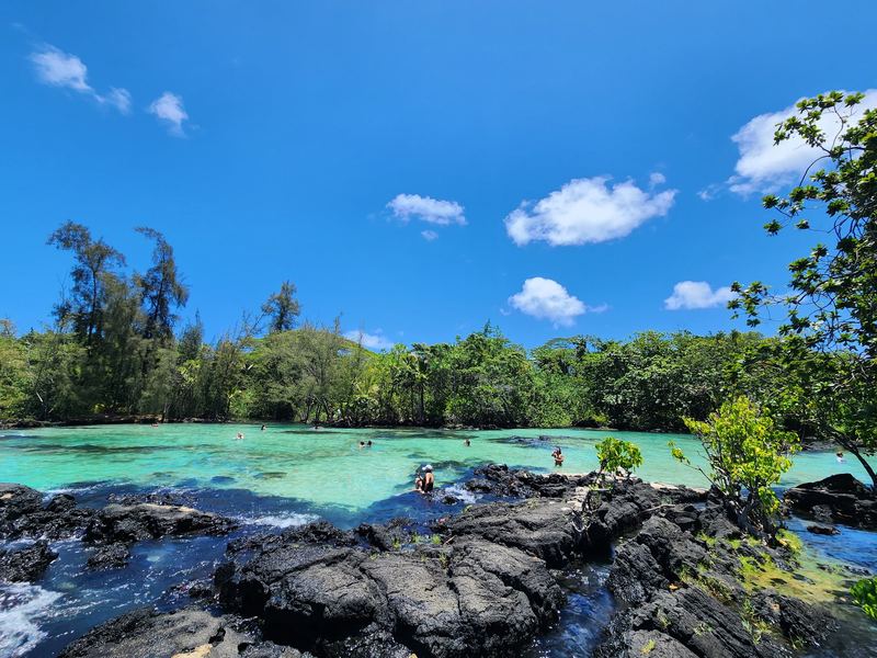 Turquoise lagoon in lava rock